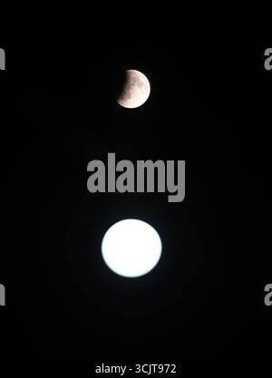 NOIDA, INDIA - SEPTEMBER 7: A view of the moon during partial umbral eclipse before a total lunar eclipse on September 7, 2025 in Noida, India. Apart from India, the lunar eclipse is also visible in Australia, the Far East, the Middle East, Europe and some parts of Africa. Photo by Sunil Ghosh/Hindustan Times Total Lunar Eclipse Visible In India Stock Photo