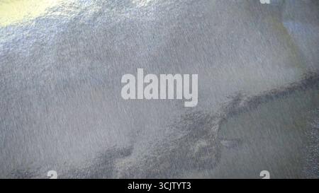 Iridescent silver foil paper texture, abstract festive background with pastel colors Stock Photo