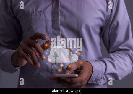 Young man with smartphone mobile hand touching to cloud computing diagram, Data storage, Cloud technology, Cloud Computing Storage Stock Photo