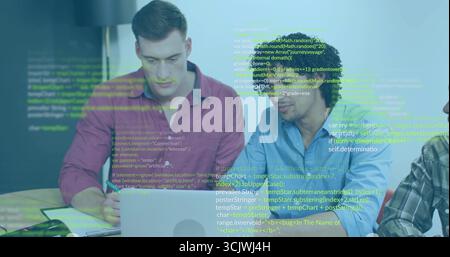 Collaborating men reviewing code on silver laptop in conference room, with floating code blocks Stock Photo