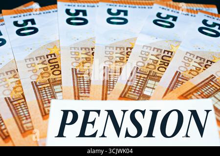 Close up of 50 euros banknotes with a yellow note saying "Pension" Stock Photo