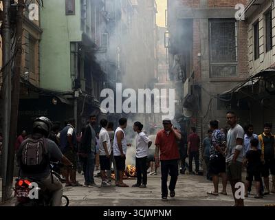 Kathmandu, Nepal. 9th Sep, 2025. People burn fire amid curfew against alleged corruption and government's decision to ban on several social media platforms in Kathmandu, Nepal on September 9, 2025. Credit: ZUMA Press, Inc./Alamy Live News Stock Photo