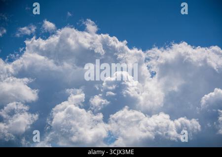 Natural daylight and white clouds floating on blue sky at sunny day Stock Photo