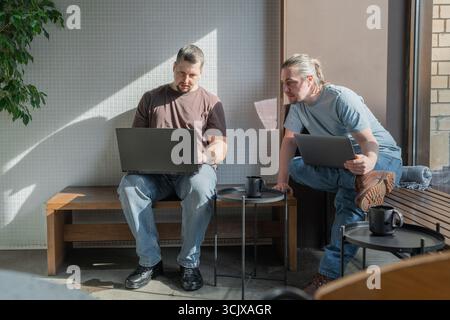 Software engineers working on project and programming in company. Business people concept. Stock Photo