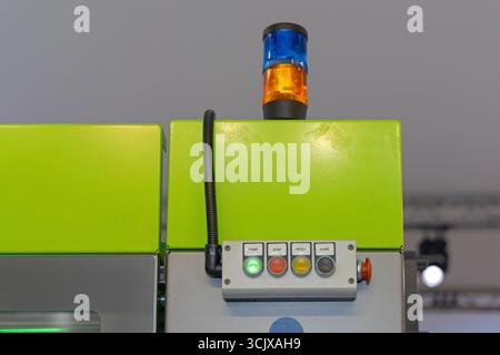 Machine Control Push Buttons Start Signal Light at Top Stock Photo