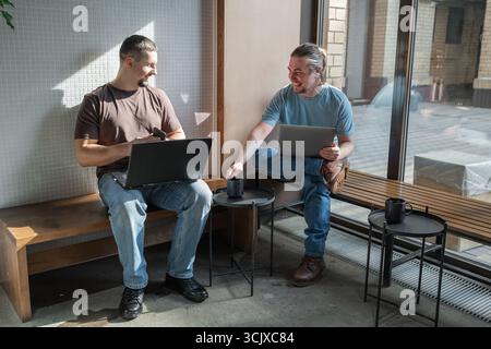 Software engineers working on project and programming in company. Business people concept. Stock Photo