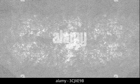 White paint splatters creating an abstract design on gray canvas texture, perfect for backgrounds and creative projects Stock Photo