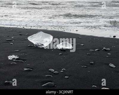Diamond Beach in Iceland with ice sculptures on the black sand beach Stock Photo