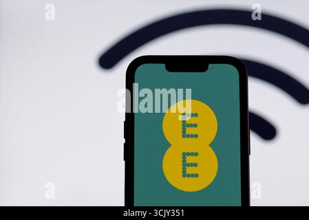 EE app on smartphone screen Stock Photo