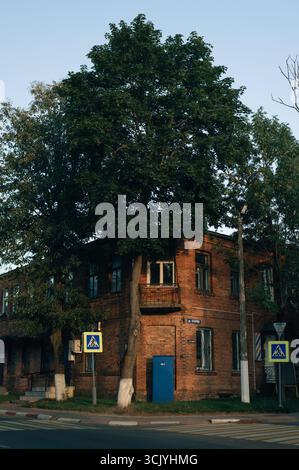 Old red brick house in the village. High quality photo Stock Photo