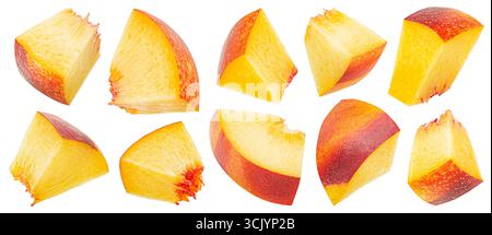 Peach slices isolated on white background with clipping path, falling nectarine cubes Stock Photo