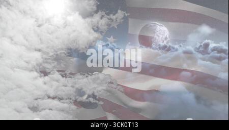 Waving American flag stretching across digital sky composite, with moon layered clouds stars Stock Photo