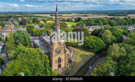 Aerial view of St Oswalds church in Winwick looking east.. The curch is recorded in the Domesday Book of 1086. Stock Photo