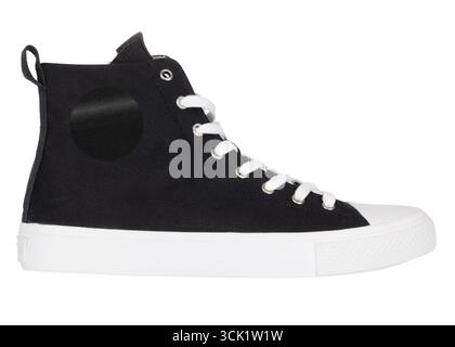Black high top canvas sneaker with white sole Stock Photo