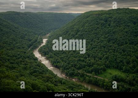 New River Bends Through Gorge on Cloudy Morning in West Virginia Stock Photo