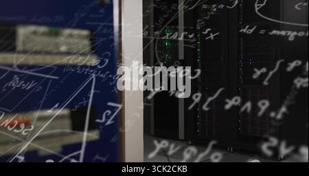 Displaying server racks inside server room corridor, with blinking LEDs, shelving unit, floor cable Stock Photo