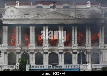Kathmandu, Bagmati, Nepal. 9th Sep, 2025. Smoke billows from the Singhadurbar, the administrative capital of Nepal as it is ransacked and set ablaze in Kathmandu on 9 September, 2025. Following the intense protest, Oli, the Communist Prime Minister of Nepal resigned from the post. Credit: ZUMA Press, Inc./Alamy Live News Stock Photo