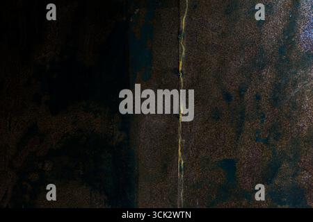 Rusty black metal texture background. Stock Photo