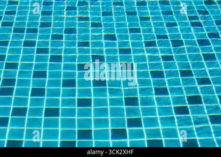 Swimming pool with water waves Stock Photo