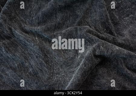 Dark bleached fabric wrinkled texture, Bleached cloth background Stock Photo