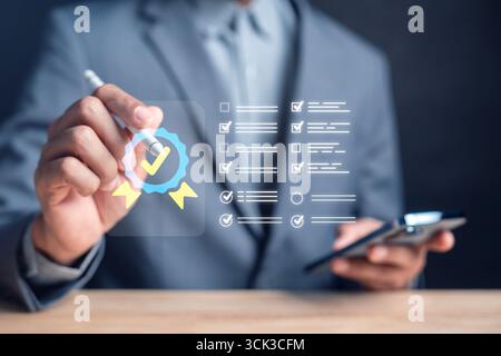 Quality assurance with digital checklist, task management, compliance verification, certification Stock Photo