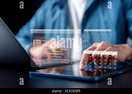 Workflow optimization with digital calendar and project timeline on tablet, task management Stock Photo