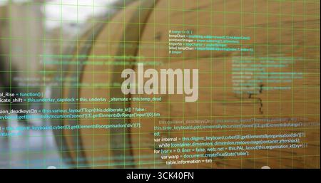 Displaying floating transparent coding interface overlay at desk, with green grid and code snippets Stock Photo