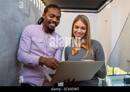 Artificial intelligence, programming innovation. Teamwork with laptops for future solutions Stock Photo