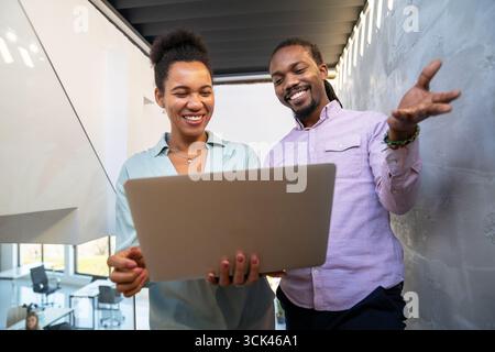 Artificial intelligence, programming innovation. Teamwork with laptops for future solutions Stock Photo