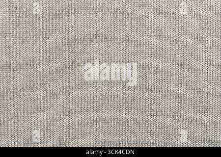 Beige cotton fabric for sofa cushions background texture. High resolution close up photography suitable for backgrounds, graphics and fashion projects Stock Photo