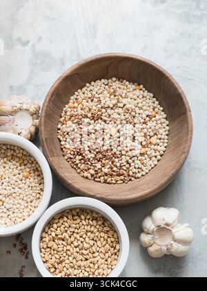 Various cereals in bowls Stock Photo
