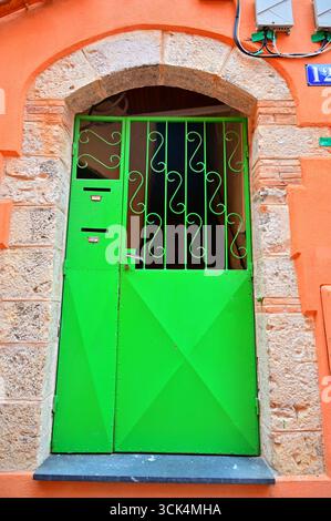 Green metal entry door in France Stock Photo