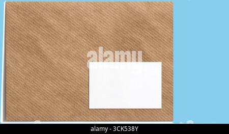 A simple brown envelope with a blank white label for addressing. Stock Photo