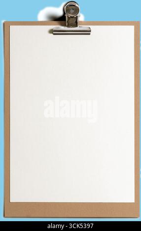 A blank clipboard with a clean sheet of paper, ready for notes or sketches. Stock Photo