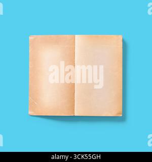 A blank, aged paper booklet opened, suggesting potential for writing or drawing. Stock Photo