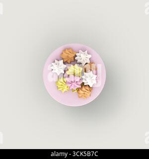 A colorful assortment of meringue cookies arranged on a pink plate, showcasing a delightful treat for dessert lovers. Stock Photo
