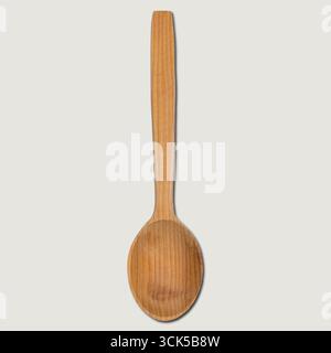 A wooden spoon with a long handle, commonly used for cooking and serving food. Stock Photo