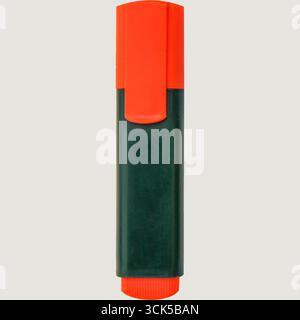 An orange and green highlighter marker designed for writing and highlighting text. Stock Photo