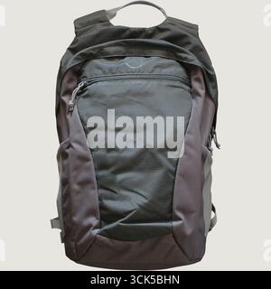 A gray and black backpack designed for carrying books and personal items, suitable for school or travel. Stock Photo