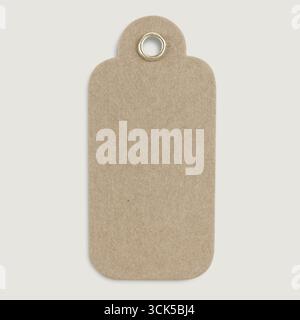 A blank, rectangular tag made of brown kraft paper, designed for labeling or tagging items. Stock Photo