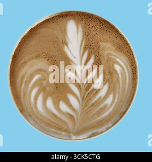 A beautifully crafted latte art featuring intricate floral patterns on a creamy coffee surface. Stock Photo