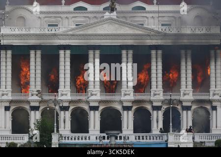 Kathmandu, Bagmati, Nepal. 9th Sep, 2025. Smoke billows from the Singhadurbar, the administrative capital of Nepal as it is ransacked and set ablaze in Kathmandu on 9 September, 2025. Following the intense protest, Oli, the Communist Prime Minister of Nepal resigned from the post. Credit: ZUMA Press, Inc./Alamy Live News Stock Photo