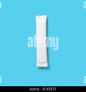 A simple, sealed white sachet, likely containing a powdered substance for various uses. Stock Photo