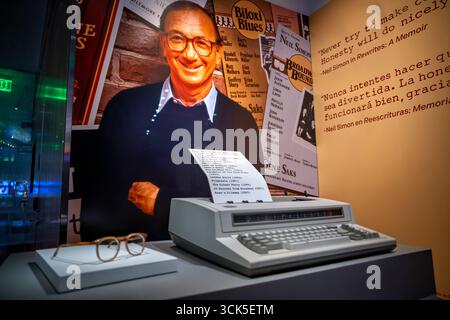 Neil Simon Eyeglasses And Typewriter Smithsonian National Museum Of American History Washington DC | WASHINGTON D.C., United States — Playwright Neil Simon's eyeglasses and the electric typewriter he used from 1979 into the 2000s are displayed at the Smithsonian National Museum of American History, alongside posters for his plays Biloxi Blues and Broadway Bound. Simon wrote more than 30 stage comedies drawing on Jewish family life and everyday adversity, becoming one of the most commercially successful playwrights in Broadway history. Stock Photo