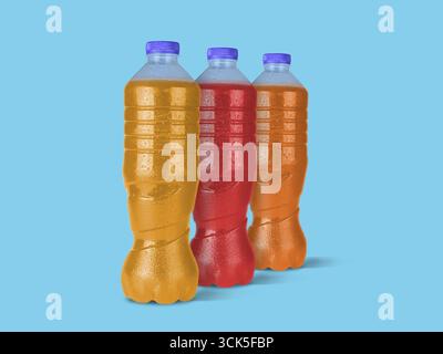 Three colorful beverage bottles filled with different drinks, showcasing vibrant colors and condensation. Stock Photo