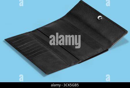 A black wallet opened to display multiple card slots and compartments for organization. Stock Photo