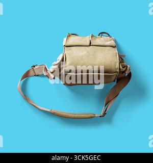 A tactical bag designed for carrying equipment, featuring multiple compartments and an adjustable strap for convenience. Stock Photo