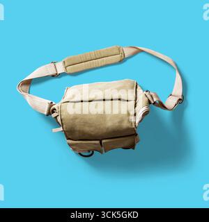 A compact, functional bag designed for carrying essentials, featuring adjustable straps for convenience. Stock Photo