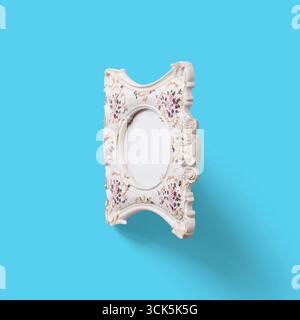 A decorative photo frame with intricate floral designs, designed to display cherished memories. Stock Photo