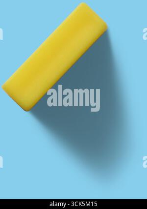 A rectangular yellow object, likely a piece of cheese or wax, shown on a transparent background. Stock Photo